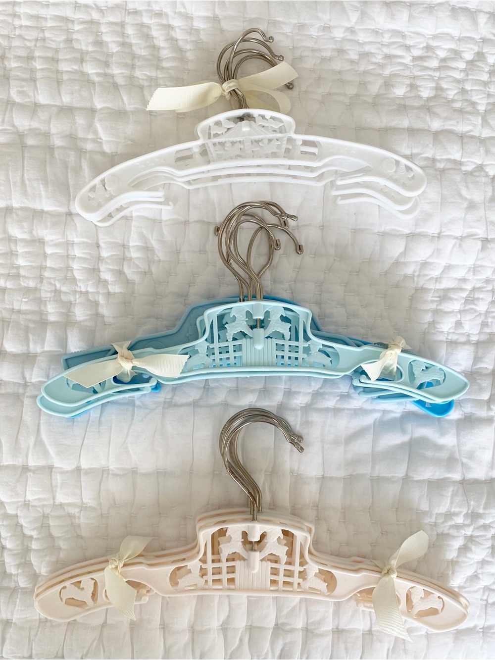 Set of 15 pink, white & baby blue Vintage 1990/1995 baby clothes hangers- rare